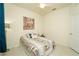 Bedroom featuring a comfortable bed and a decorative Buddha wall art at 5029 Walker St, St Cloud, FL 34771