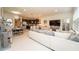 Open floor plan featuring kitchen, living and dining spaces with lots of natural light at 5029 Walker St, St Cloud, FL 34771