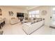 Inviting living room bathed in natural light features comfortable seating at 5029 Walker St, St Cloud, FL 34771