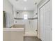 Bathroom featuring glass door shower with subway tile surround and built in shelves at 5984 Ed Harris Ct, St Cloud, FL 34771