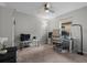 Neutral bedroom with a desk and chair, two dressers and natural light at 672 Seven Oaks Blvd, Winter Springs, FL 32708