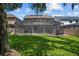 Enclosed pool and backyard providing a private oasis for swimming and outdoor enjoyment at 672 Seven Oaks Blvd, Winter Springs, FL 32708
