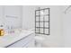 Modern bathroom with a black-framed shower and a sleek, white vanity at 744 Curly Locks Loop, Apopka, FL 32703