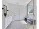 Bathroom showcasing a glass-enclosed shower, stylish tile flooring, and a vanity with a vessel sink at 744 Curly Locks Loop, Apopka, FL 32703