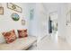 Inviting hallway with stylish decor and bright, neutral walls at 744 Curly Locks Loop, Apopka, FL 32703
