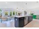Modern living space with kitchen featuring stainless steel appliances, and an open-concept design perfect for entertaining at 744 Curly Locks Loop, Apopka, FL 32703