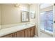 Bathroom featuring a single vanity and a stand-up shower at 8040 Sagebrush Pl, Orlando, FL 32822