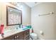Bathroom featuring a single vanity and a shower/tub combination at 8040 Sagebrush Pl, Orlando, FL 32822