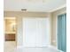 Bedroom featuring tile floors, neutral paint, and white closet doors at 8040 Sagebrush Pl, Orlando, FL 32822