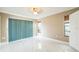 Bedroom featuring tile floors, neutral paint, and a sliding glass door at 8040 Sagebrush Pl, Orlando, FL 32822