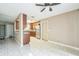 Bright, airy kitchen offering bar seating with a view of the dining and living areas at 8040 Sagebrush Pl, Orlando, FL 32822