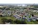 Community aerial showcasing the property's location near shopping and community amenities at 831 Corvina Dr, Davenport, FL 33897