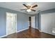 Neutral gray bedroom with closet and ensuite bathroom at 831 Corvina Dr, Davenport, FL 33897