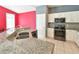 Kitchen island features granite countertops and stainless steel appliances, sink, and dishwasher at 831 Corvina Dr, Davenport, FL 33897