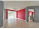 Open-concept living room with sliding glass doors to the pool and tile flooring at 831 Corvina Dr, Davenport, FL 33897