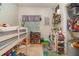 bedroom features lofted bed, playroom area and natural light at 845 Edgewater Cir, Eustis, FL 32726