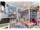 A cute bedroom with a metal loft bed, colorful storage, and a whimsical aesthetic at 845 Edgewater Cir, Eustis, FL 32726