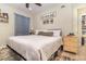 Bedroom with ceiling fan, natural light and minimalist decor at 845 Edgewater Cir, Eustis, FL 32726