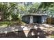 This cozy home has a welcoming front yard, a covered entryway, and a well-maintained lawn at 845 Edgewater Cir, Eustis, FL 32726