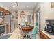 Cozy eat-in kitchen with stainless appliances, wooden cabinets and backyard access at 845 Edgewater Cir, Eustis, FL 32726