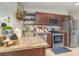 Kitchen featuring stainless appliances, granite countertops, and ample cabinet space at 845 Edgewater Cir, Eustis, FL 32726
