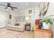 Comfortable living room with a neutral color scheme, a plush sofa, and a stylish area rug at 845 Edgewater Cir, Eustis, FL 32726