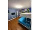 Bedroom featuring bunk bed and Toy Story-themed mural at 8894 Candy Palm Rd, Kissimmee, FL 34747