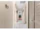 Hallway with closet leads to the home's bedrooms and bathrooms at 9326 Bay Vista Estates Blvd, Orlando, FL 32836