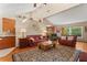 Cozy living area with hardwood floors, neutral walls, and an open layout at 9326 Bay Vista Estates Blvd, Orlando, FL 32836