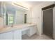 Bright bathroom with a double sink vanity and shower, offering a clean and functional space at 940 Douglas Ave # 132, Altamonte Springs, FL 32714