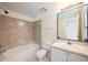 Clean bathroom featuring a bathtub, toilet, and a vanity with a sink and mirror at 940 Douglas Ave # 132, Altamonte Springs, FL 32714