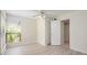 Cozy bedroom features a ceiling fan, neutral walls, and a bright window with natural light at 940 Douglas Ave # 132, Altamonte Springs, FL 32714