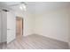 Bright bedroom features a ceiling fan, neutral walls, and modern floors at 940 Douglas Ave # 132, Altamonte Springs, FL 32714