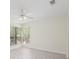 Inviting bedroom features a ceiling fan, natural light, and modern floors at 940 Douglas Ave # 132, Altamonte Springs, FL 32714