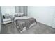 Cozy bedroom with soft carpet, modern decor, and a tranquil ambiance at 976 Leader St, Davenport, FL 33896
