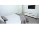 Well-lit bedroom featuring plush carpet, modern dresser, and a calming atmosphere at 976 Leader St, Davenport, FL 33896