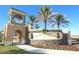 Welcoming entrance to ChampionsGate featuring lush landscaping and a charming stone sign at 976 Leader St, Davenport, FL 33896