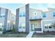 Modern two-story home with stone accents and well-maintained landscaping at 976 Leader St, Davenport, FL 33896