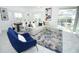 Comfortable living room featuring elegant furniture, stylish decor, and sliding doors at 976 Leader St, Davenport, FL 33896