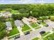 Aerial view of a neighborhood with tree-lined streets at 9814 Piney Point Cir, Orlando, FL 32825