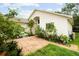 Beautifully landscaped front yard with greenery and well-maintained garden at 9814 Piney Point Cir, Orlando, FL 32825