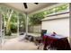 Screened patio with concrete floors offering outdoor views at 9814 Piney Point Cir, Orlando, FL 32825