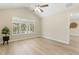Bright bedroom featuring high ceilings, big windows and neutral paint at 1031 Morningside Dr, Eustis, FL 32726