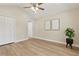 Bedroom with ceiling fan, and neutral color paint at 1031 Morningside Dr, Eustis, FL 32726