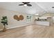 Bright living room with hardwood floors and a modern, open-concept design at 1031 Morningside Dr, Eustis, FL 32726