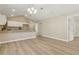 Open-concept living space with seamless flow to the kitchen, ideal for entertaining at 1031 Morningside Dr, Eustis, FL 32726
