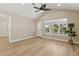 Contemporary living room with spacious layout, showcasing the front door and outdoor views at 1031 Morningside Dr, Eustis, FL 32726