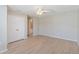 Bedroom with closet, ceiling fan and wood-look flooring at 13519 Bicton Ln, Windermere, FL 34786