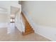 Staircase with tile floors and adjacent doorway at 13519 Bicton Ln, Windermere, FL 34786