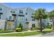 Charming multi-story townhouse with a well-maintained front yard and inviting entrance at 13618 Heaney Ave, Orlando, FL 32827